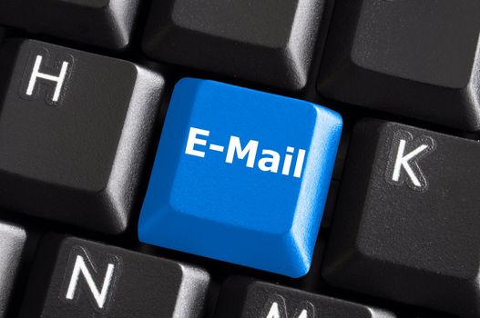 internet email communication concept with a button on computer keyboard