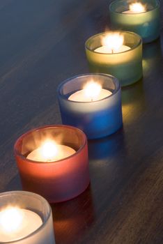 a set of 5 tea light candles