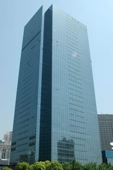 China, Shanghai city, single office buildings, modern skyscraper.