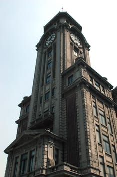 China, Shanghai city. Old clock tower in classic style near People's Square.