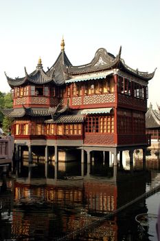 China, Shanghai city. Traditional, ancient Chinese architecture, made of wood. Pagoda in old town called YuYuan (Cheng Huang Miao).