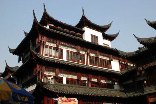 China, Shanghai city. Traditional, ancient Chinese architecture, made of wood. Pagoda in old town called YuYuan (Cheng Huang Miao).