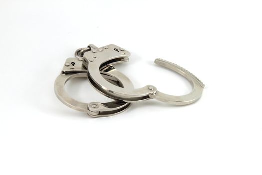 Police handcuffs isolate with copy space.
