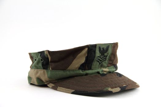 A military camouflage 8 point cover isolated.