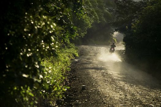 Motorcycle on a dirt road at dusk in Santa Elena Costa Rica