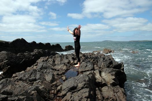 a beautiful woman doing yoga to show a healthy way to live a happy and relaxed lifestyle in a world full of stress