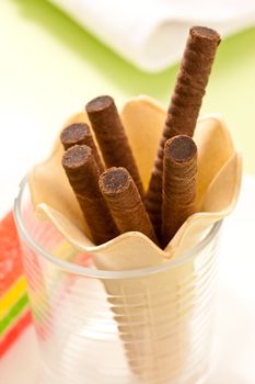 food series: tasty chocolate cookie sticks in glass