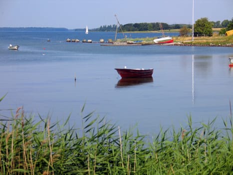Small fishing harbor beach Funen Denmark