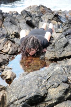 a beautiful woman doing yoga to show a healthy way to live a happy and relaxed lifestyle in a world full of stress