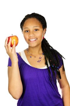 Isolated portrait of black teenage girl holding apple