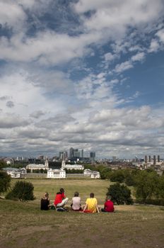 A family looking at a view of the london skyline