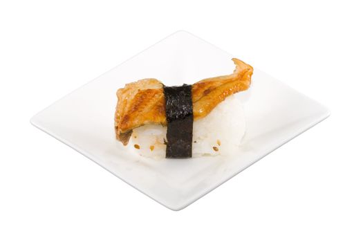 a square white plate with a piece of sushi