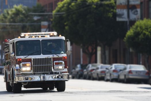 Fire truck speeding down street