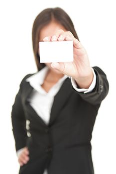 Businesswoman in suit holding business card. Beautiful (really!) mixed chinese asian / caucasian business woman. Isolated on seamless white background.