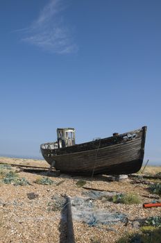 An old fishing boat on the beach at Dungeness