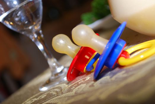 Tow Pacifiers - Soothers (baby's dummies) on a table