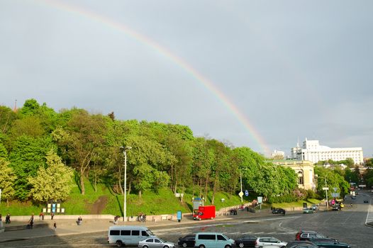 rainbow over city landscape