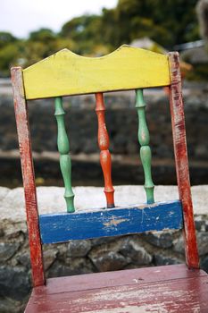 Back of a colorful chair with peeling paint in Nicaragua
