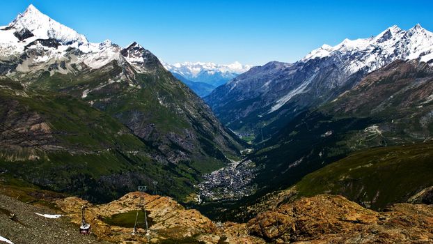 The Swiss resort Zermatt on a sunny summer day with clear blue sky