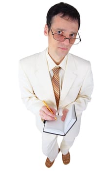 A young man in a white suit with a notebook in his hands