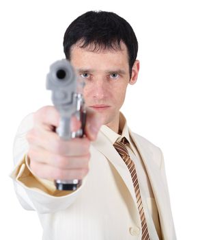 Businessman aiming a gun, isolated on a white background