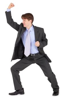 Young man beats his fist isolated on a white background