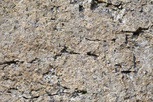 The texture of natural rock with the roughness and patches