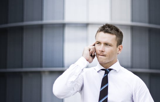 Photo Of A Busy Corporate Man On The Cell Phone