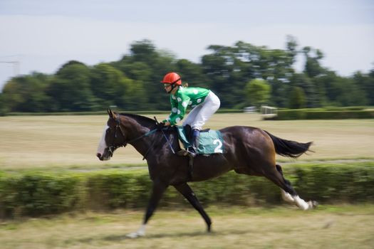 Horse race jockey in competition