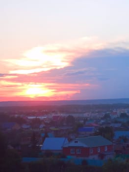 Photo of small village in the evening during a beautiful decline