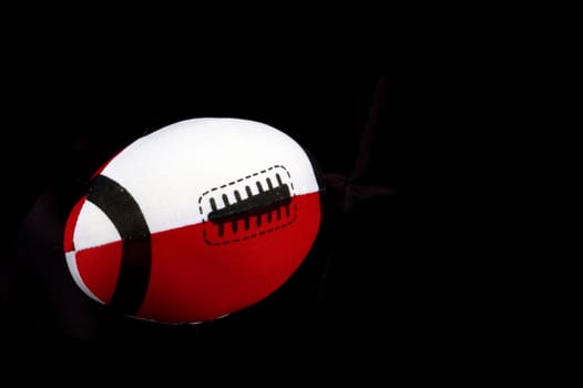 rugby ball isolated on a black background