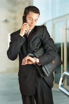 Businessman walking in a modern building