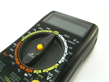 image of a digital multimeter over a white background