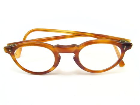 Image of old glasses over a white background