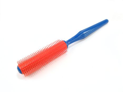 image of a hairbrush over a white background