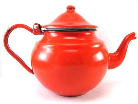 an image of a red teapot over a white background