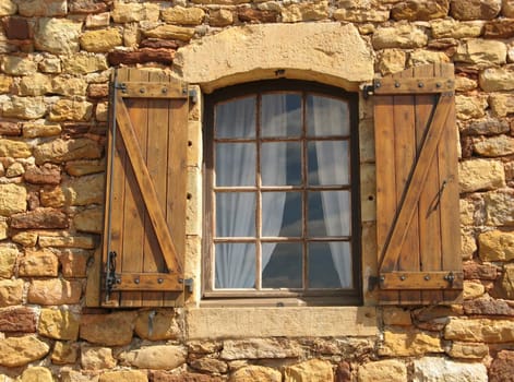 a window of a stony house