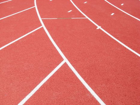 an image of lanes of a red race track