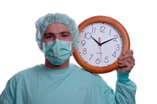 young doctor holding wall clock over white