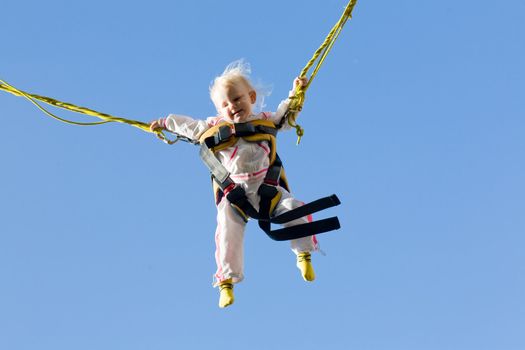 small girl on the trampoline