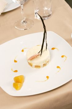 Artistic Dessert with ice-cream on restaurant table