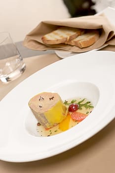 Foie gras, French healthy food served with bred