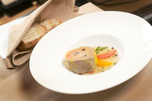 Foie gras, French healthy food served with bred