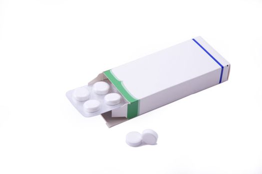 Image of a pills blister getting out form the box over white background