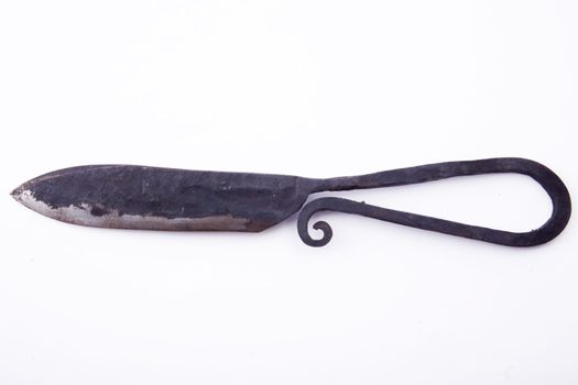 old knife made by blacksmith from iron