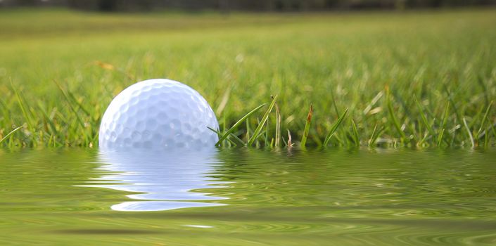 Closeup of golf ball in simulated water