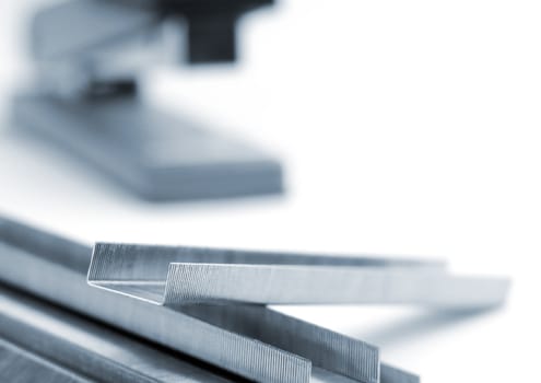 Macro shot of office stapler and staples 