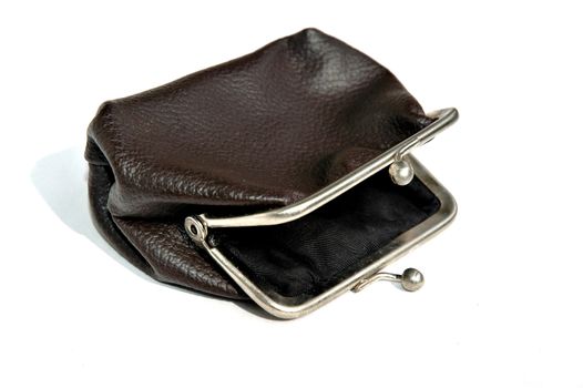 Old-fashioned empty purse from an imitation leather on a white background