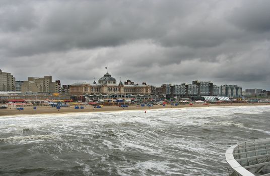 Hotel Kurhaus on the Scheveningen beach in stormy weather