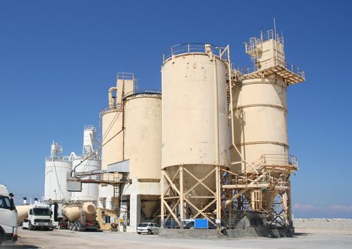 Cement industry with silos and trucks